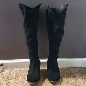 Tall black suede boots